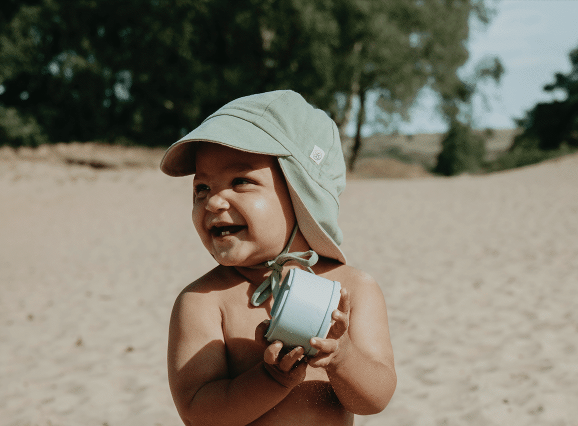 Cloby - omkeerbare zonnehoedje UPF 50+ olive green/sandy beach